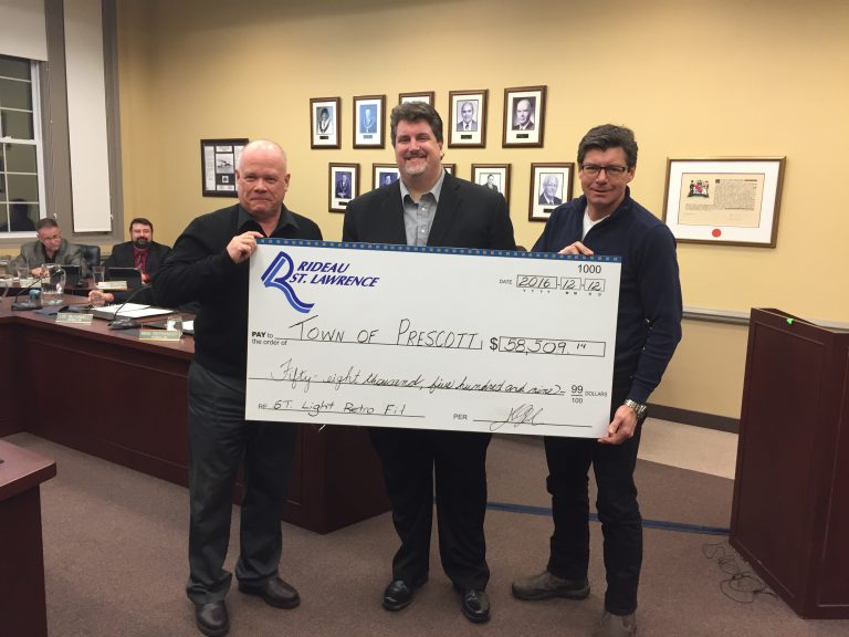 Rideau St. Lawrence Distribution Presents Cheque, Answers Concerns