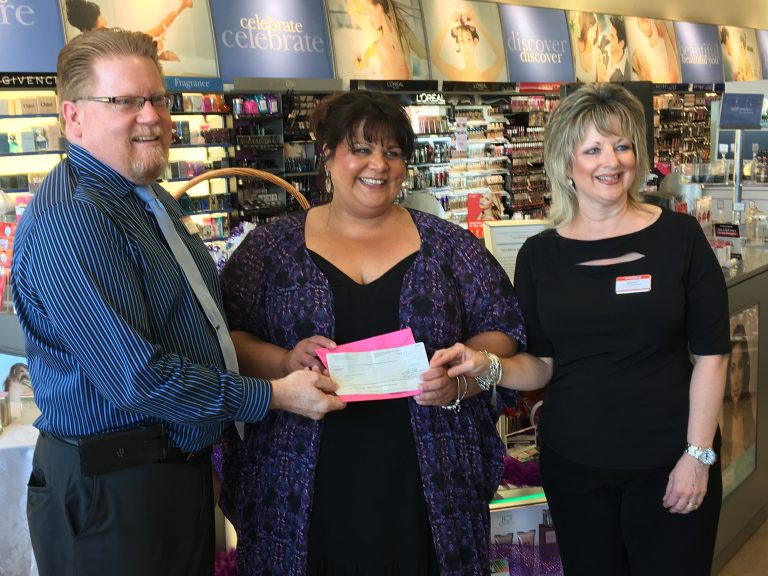 Brockville Shopper’s Drug Mart present cheque to Interval House