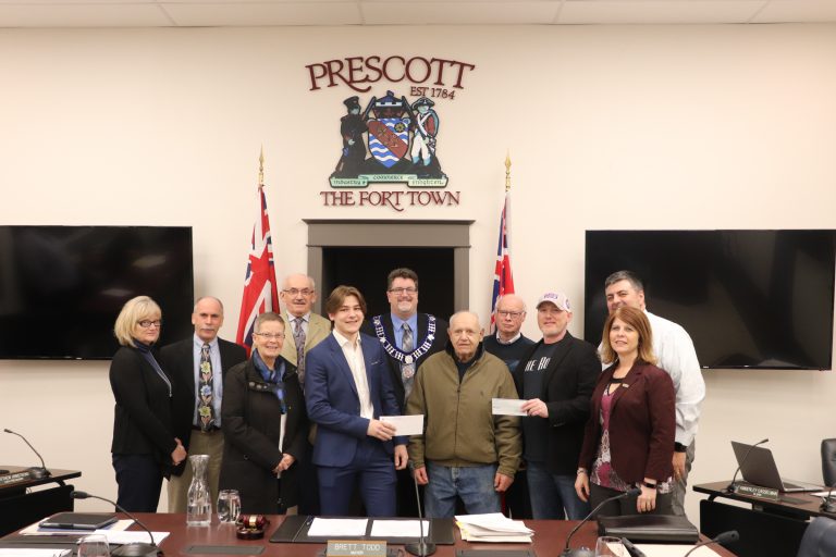 Locals present cheques to Prescott Council for new arena